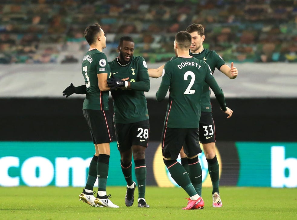 <p>Ndombele celebrates with teammates after scoring the opener</p>