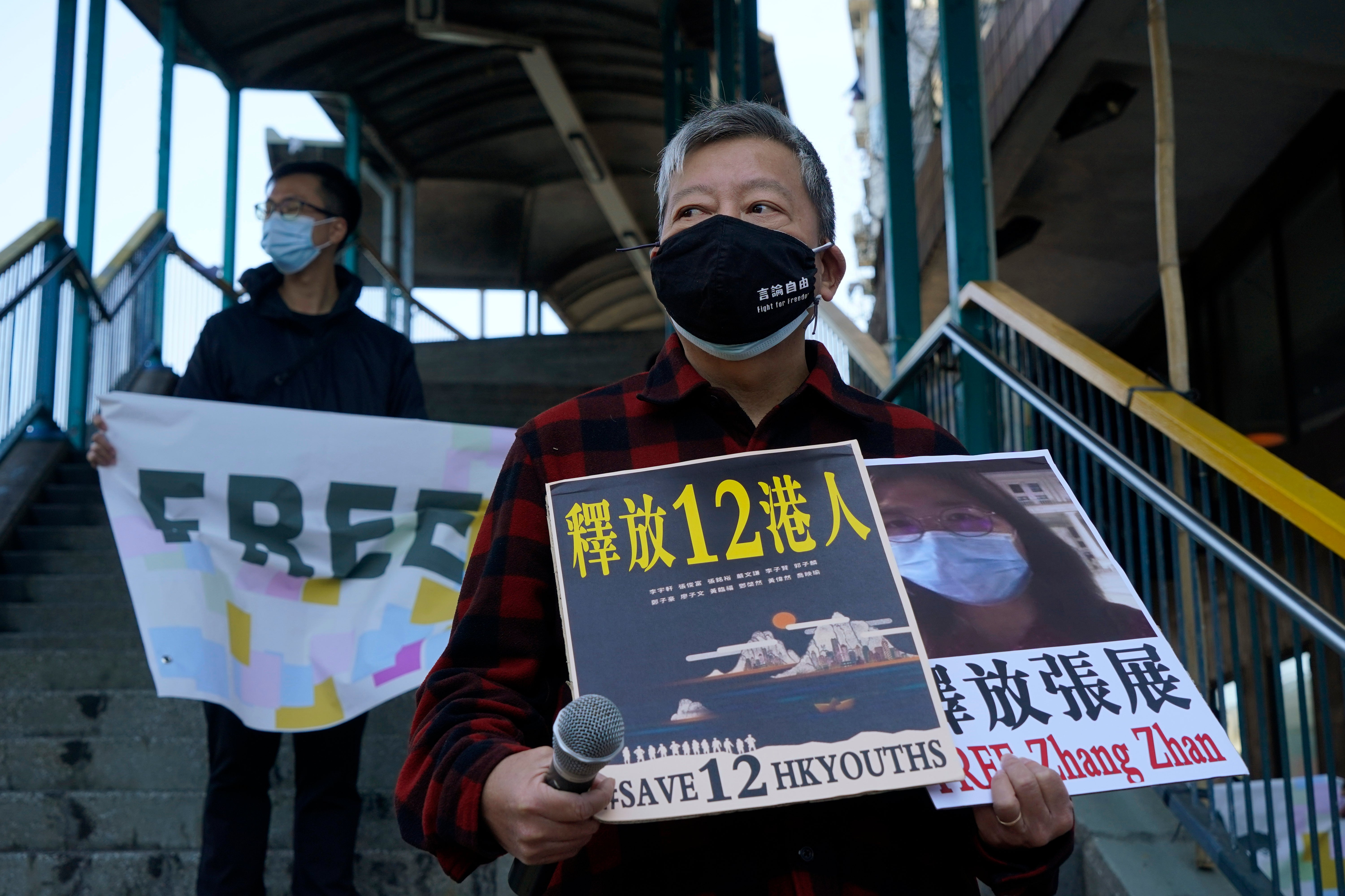 File Image: Democracy activist Lee Cheuk-Yan speaks outside China’s Liaison Office in Hong Kong on December 28, 2020, during a protest calling on China to free a group of Hong Kong activists, as well as Chinese citizen journalist Zhang Zhan