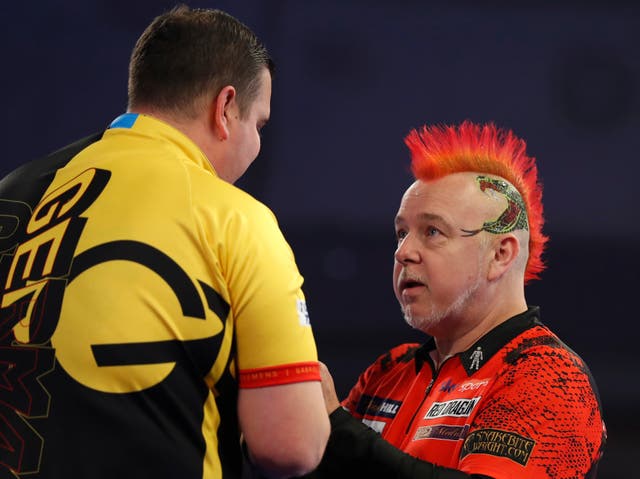 <p>Peter Wright (right) missed out on a place in the last 16</p>