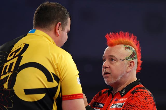 <p>Peter Wright (right) missed out on a place in the last 16</p>