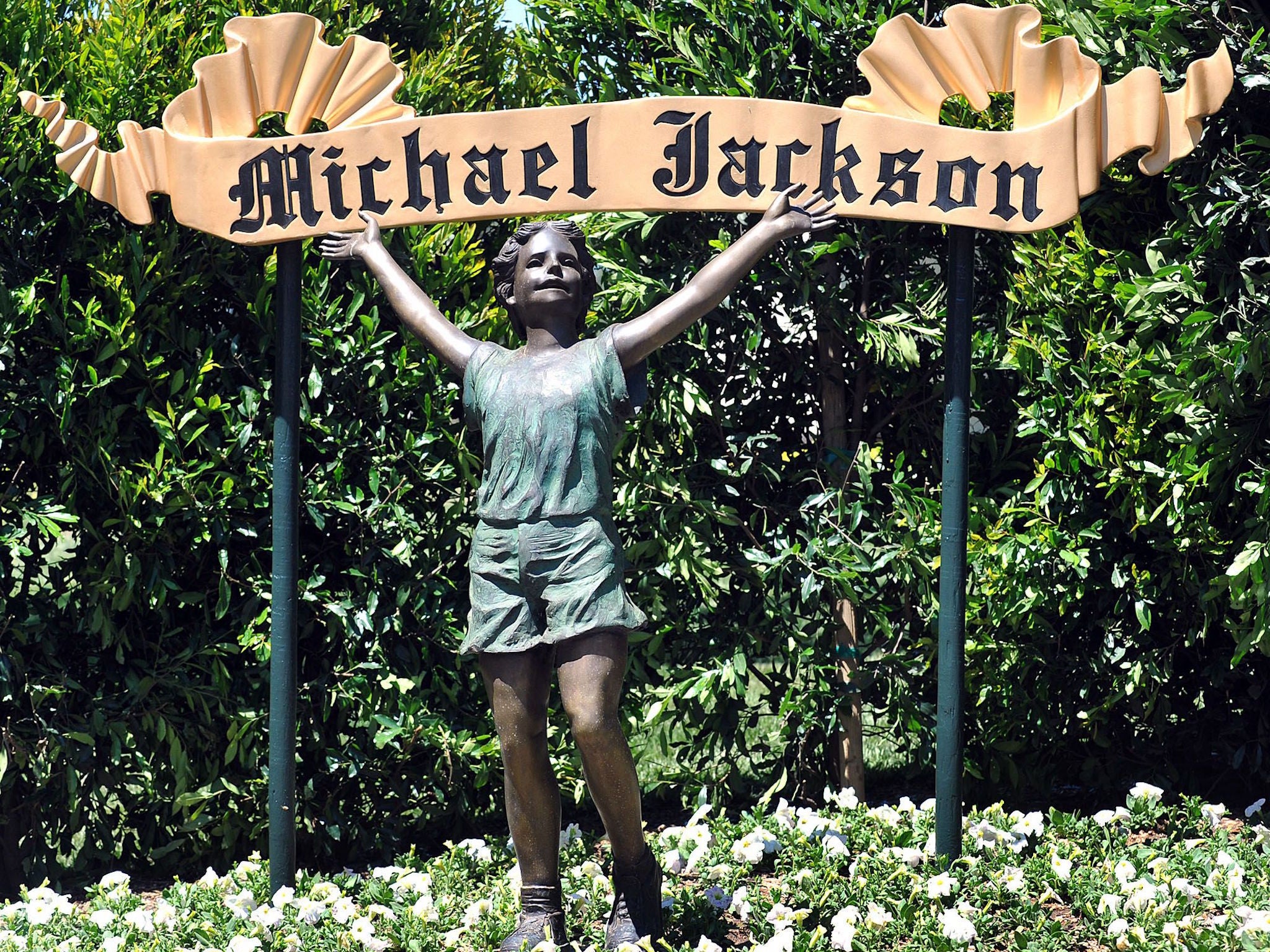 One of two welcome signs that marked the entrance to the ranch, which Jackson named for the fantasy world inhabited by Peter Pan, the boy who never grew up