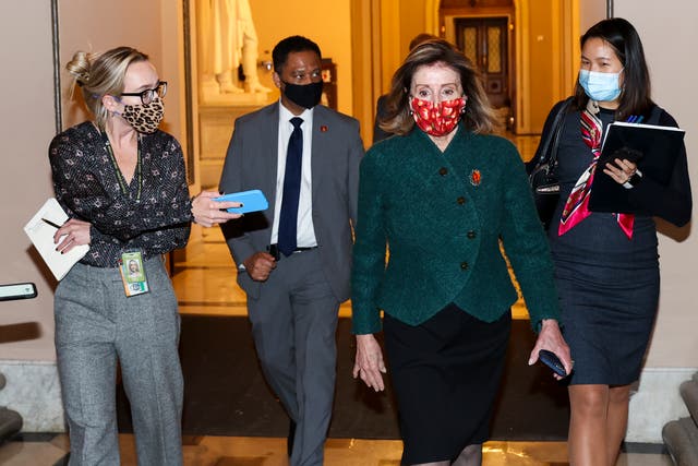 Speaker of the House Nancy Pelosi (D-CA) heads back to her office after leaving the house floor on December 28, 2020 in Washington, DC. President Donald Trump signed a COVID relief bill and government funding bill into law Sunday night, averting a government shutdown.