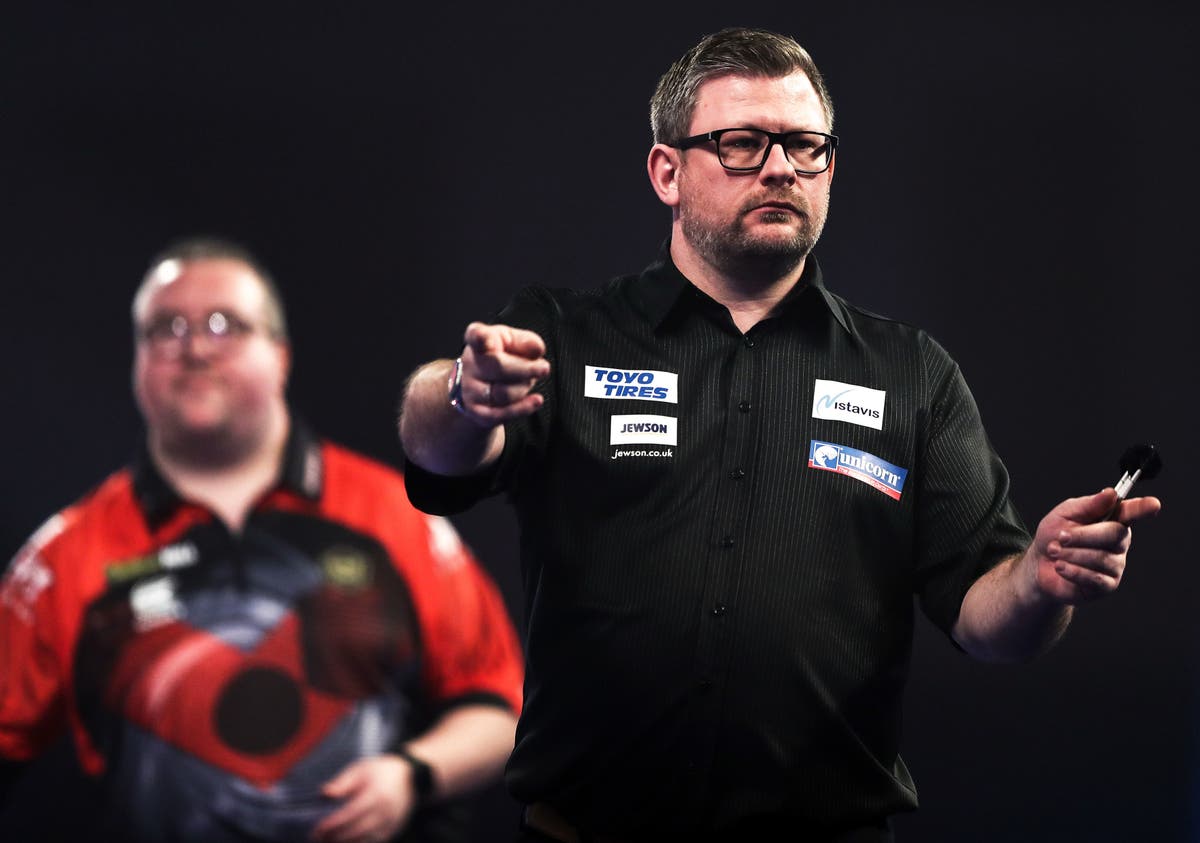 World Darts Championship: James Wade throws first nine-darter in five years before crashing out