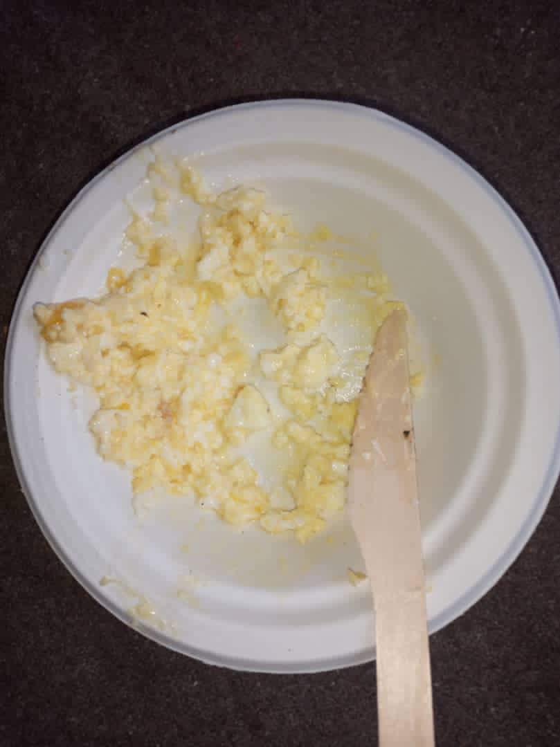 A photo appears to show runny scrambled eggs being served to asylum seekers and migrants at the Penally camp.