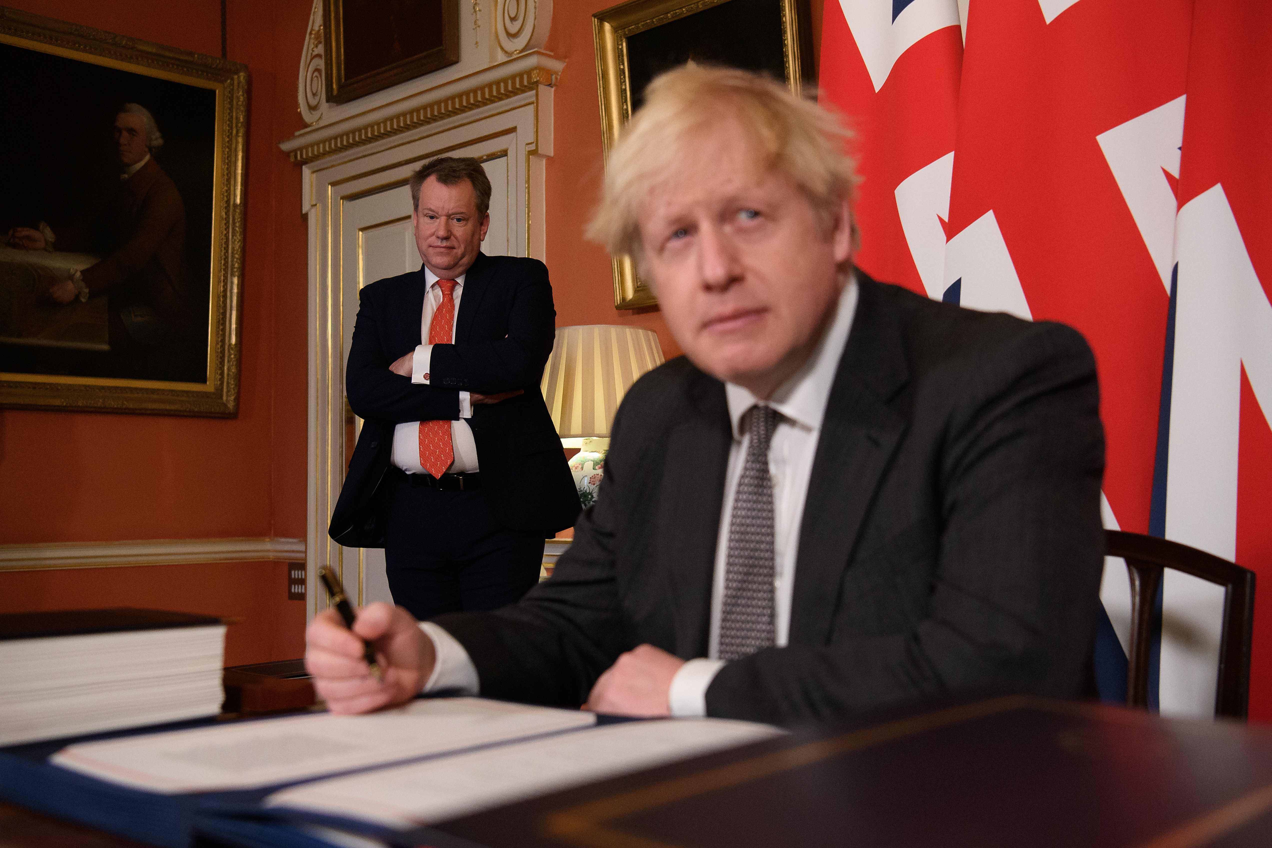 <p>Boris Johnson, right, with UK chief trade negotiator, David Frost</p>