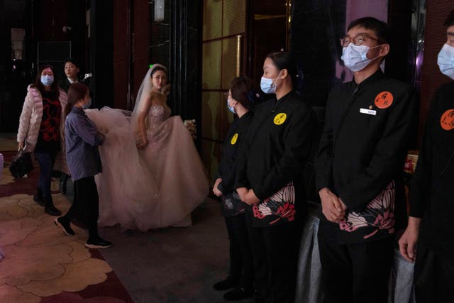APTOPIX Virus Outbreak China Wedding Photo Gallery