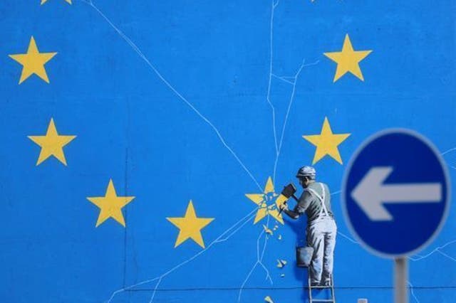 <p>A view of the Brexit-inspired mural by the artist Banksy in Dover, Kent</p>