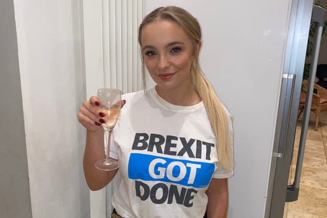 <p>Brexit supporter Emily Hewertson celebrates trade deal ahead of the UK’s exit from EU single market&nbsp;</p>