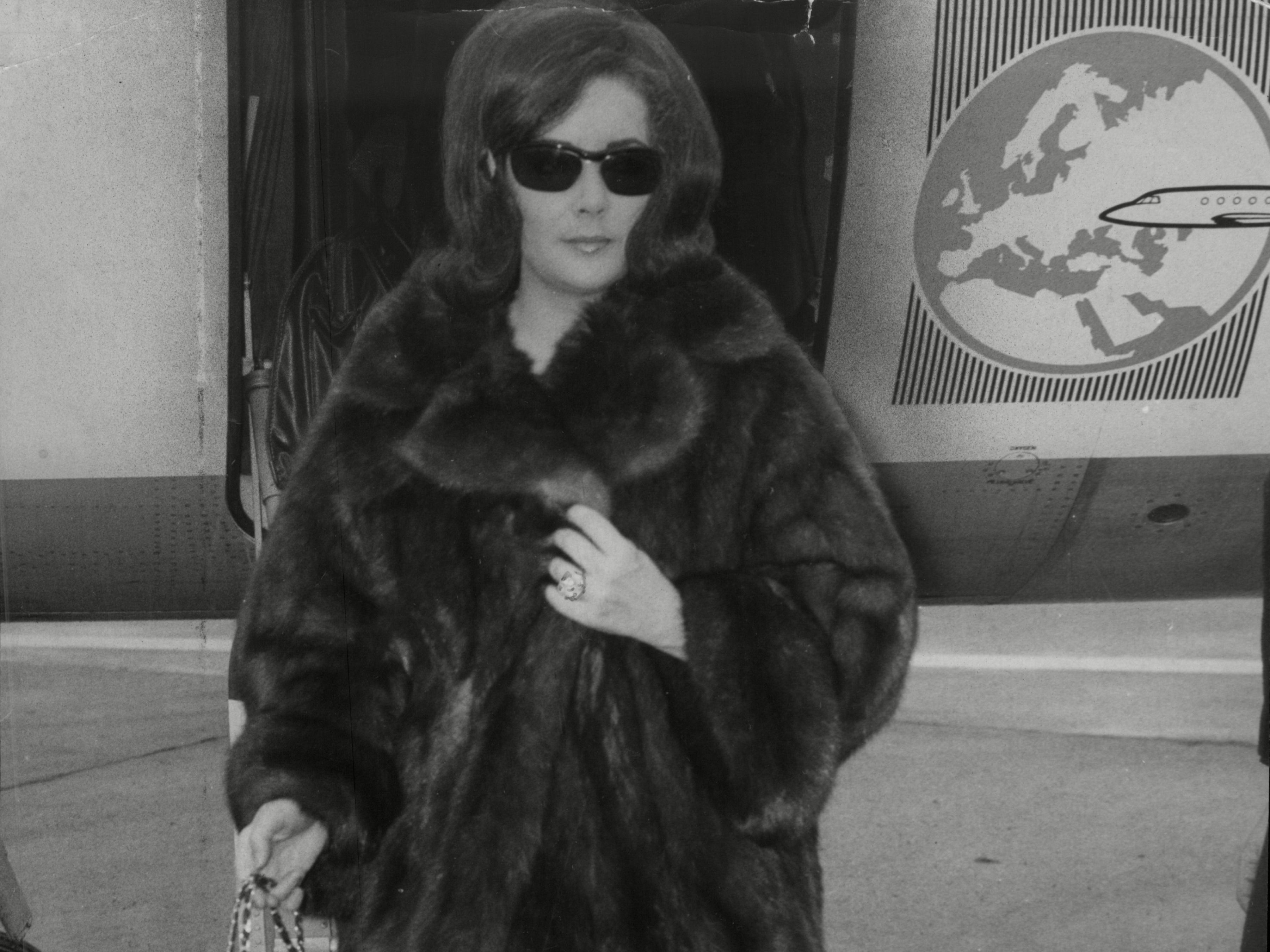 Actress Elizabeth Taylor Wearing A Mink Coat