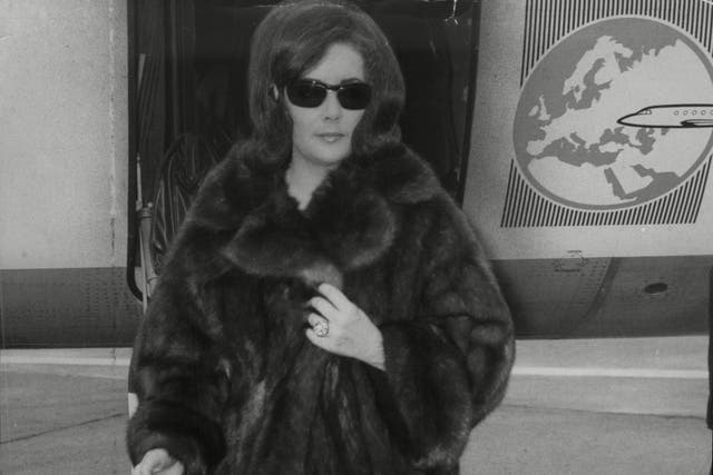 <p>Actress Elizabeth Taylor Wearing A Mink Coat</p>