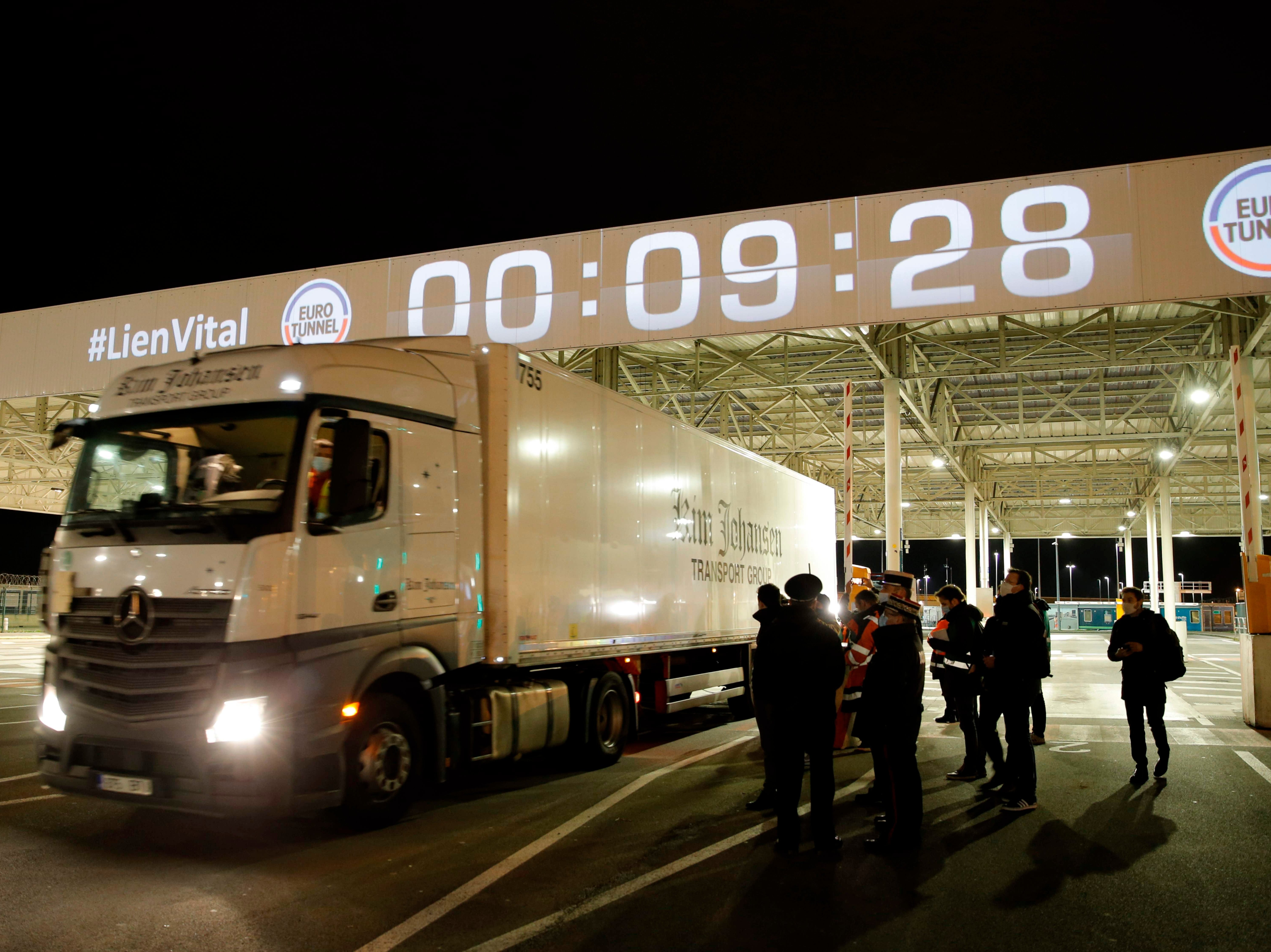 The first lorry enters the Eurotunnel terminal post Brexit in Coquelles, northern France