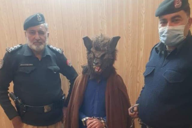 <p>A man in Peshawar dressed as a werewolf to scare people&nbsp;</p>