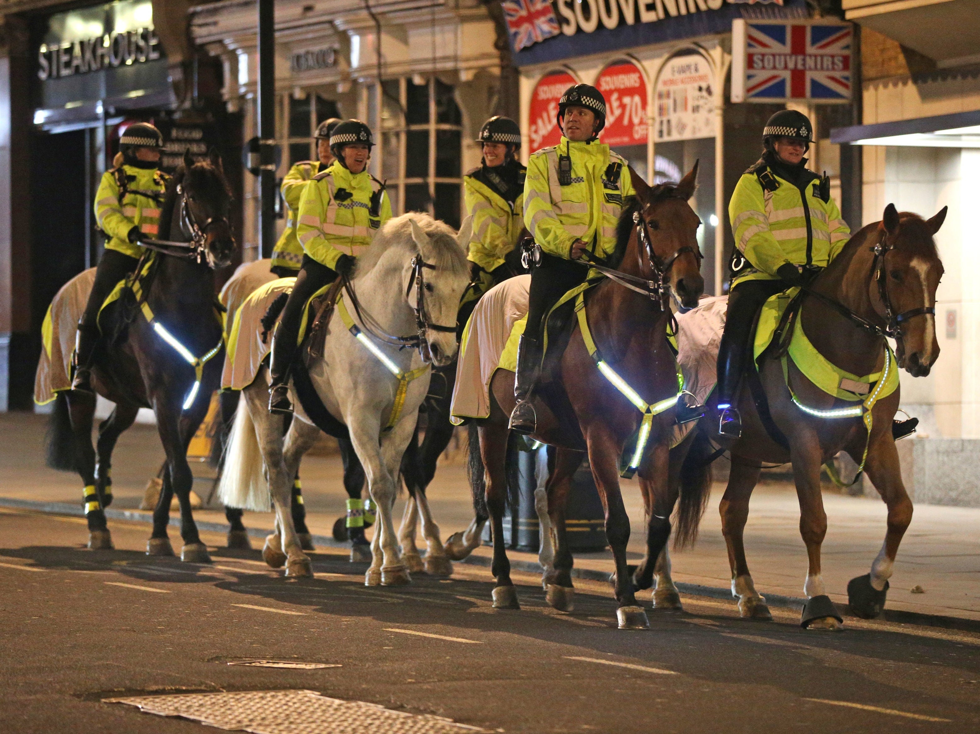 Mounted police patrol St James’s, London, on New Year’s Eve
