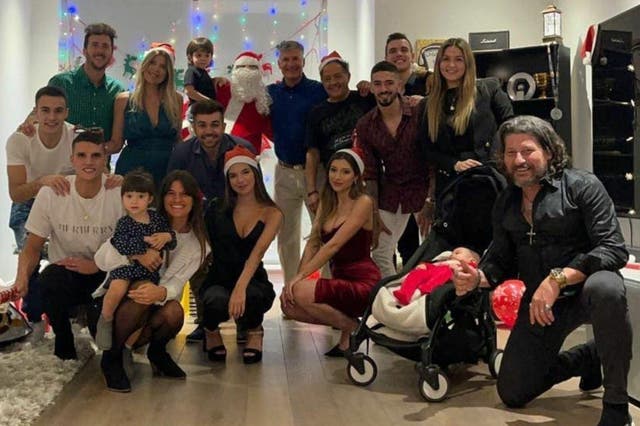 The players together with their families