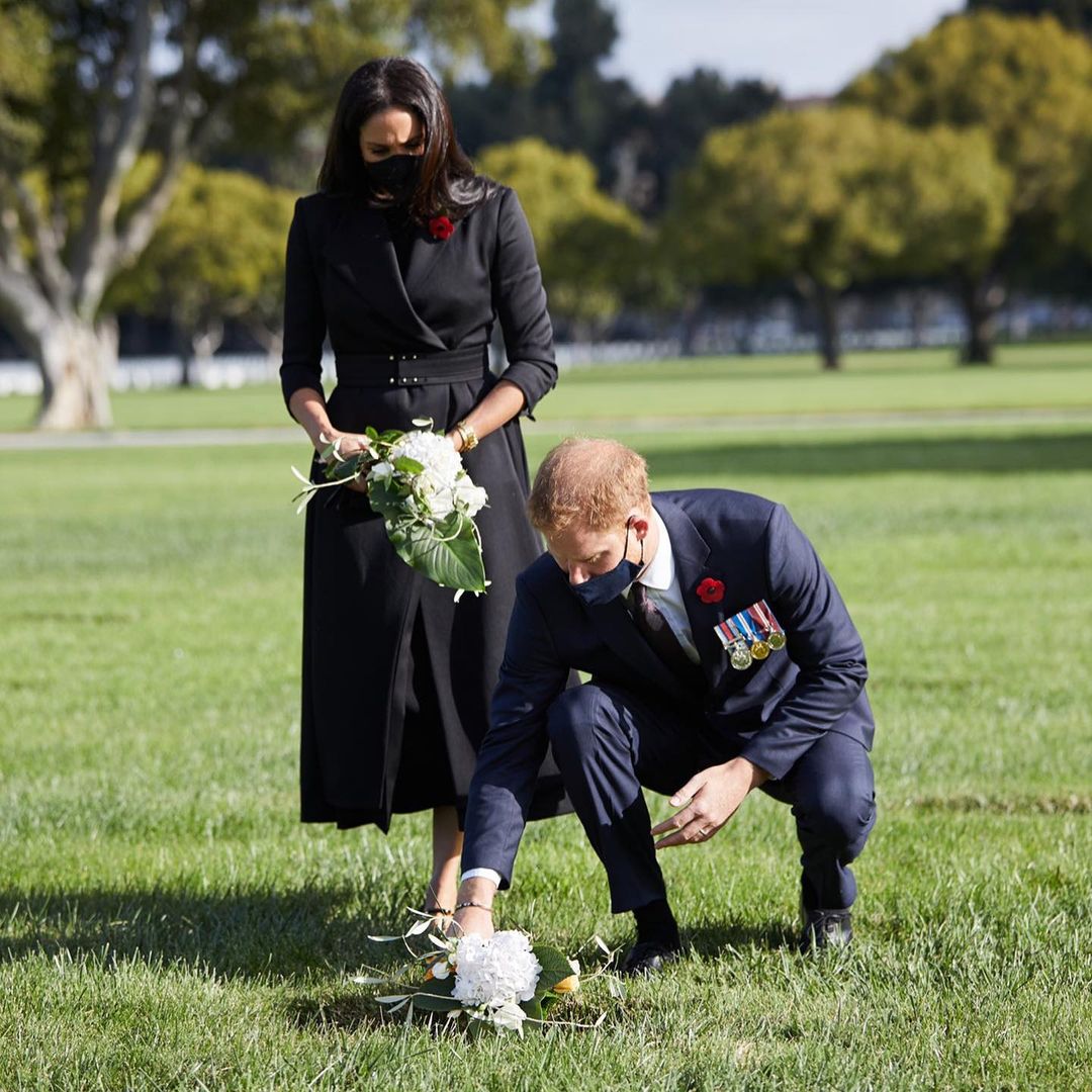 The Duke and Duchess of Sussex laying flowers in Los Angeles