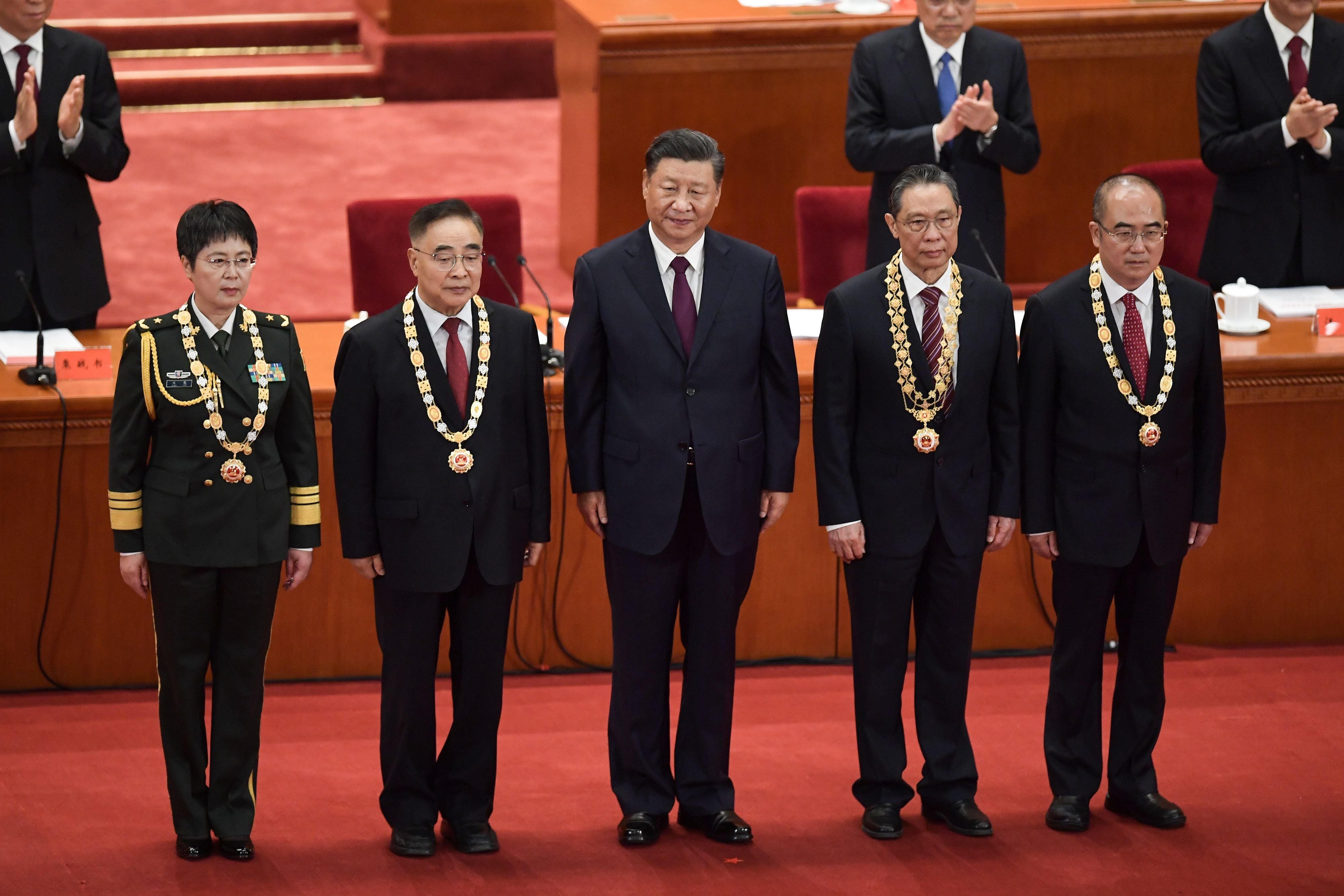 President Xi Jinping with leading health officials at a ceremony to honour people who fought against the pandemic