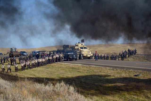<p>Militarised police on 27 October at Standing Rock. 141 members of the Ponca Nation tribe were arrested, while peacefully trying to stop the Dakota Access Pipeline.&nbsp;</p>
