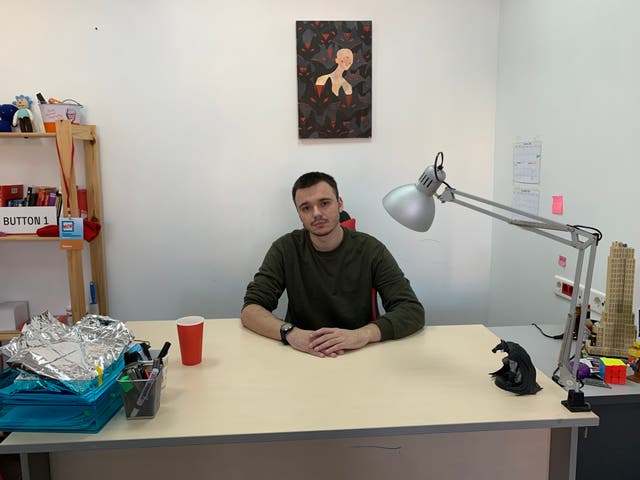 <p>Ruslan Shaveddinov at his office in Moscow a year after he was conscripted to Russia’s Arctic</p>