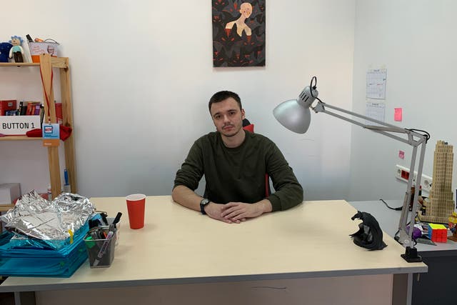 <p>Ruslan Shaveddinov at his office in Moscow a year after he was conscripted to Russia’s Arctic</p>