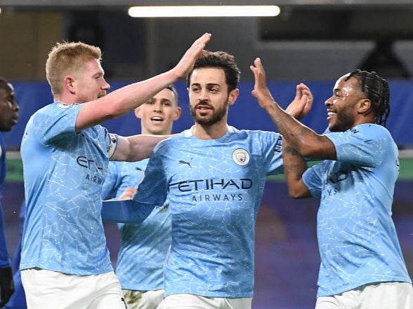 Kevin De Bruyne celebrates with Raheem Sterling and Bernardo Silva