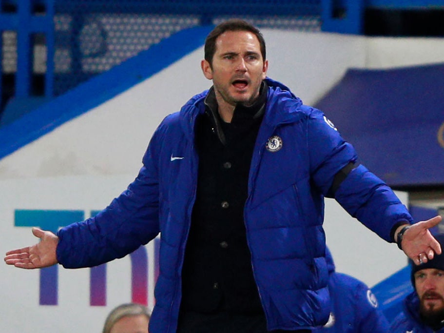 Frank Lampard watches as his Chelsea side are swept aside by Man City