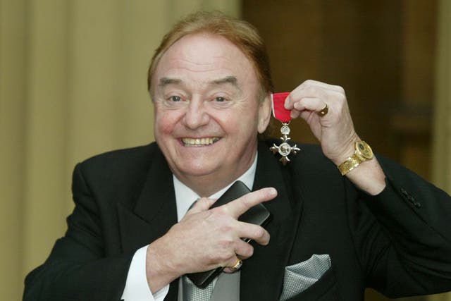 <p>Marsden with his MBE for services to charity at Buckingham Palace in December 2003. He helped raise more than £35m for good causes</p>