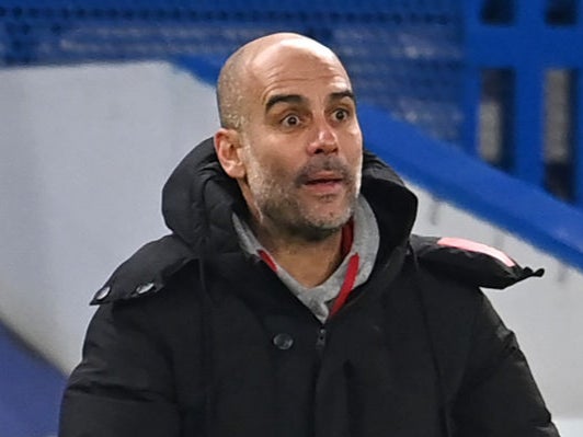 Pep Guardiola gestures on the touchline during City’s game against Chelsea