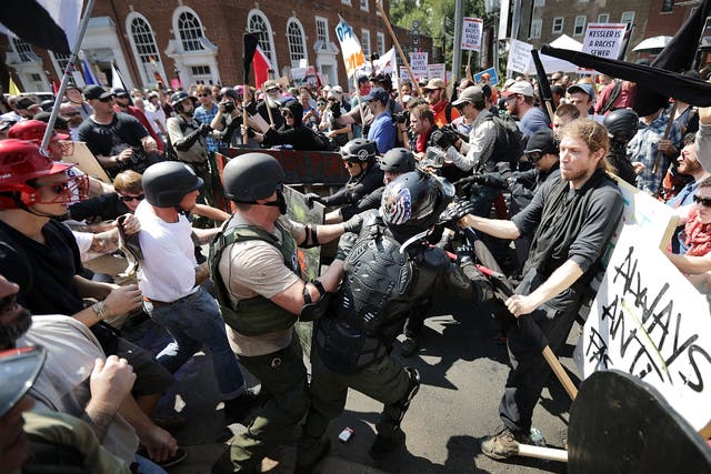 <p>White nationalists, neo-Nazis and members of the alt-right clash with counter-protesters in Virginia</p>