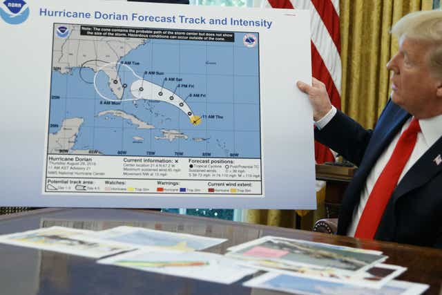 Trump presenting his own weather map complete with Alabama looped in by Sharpie