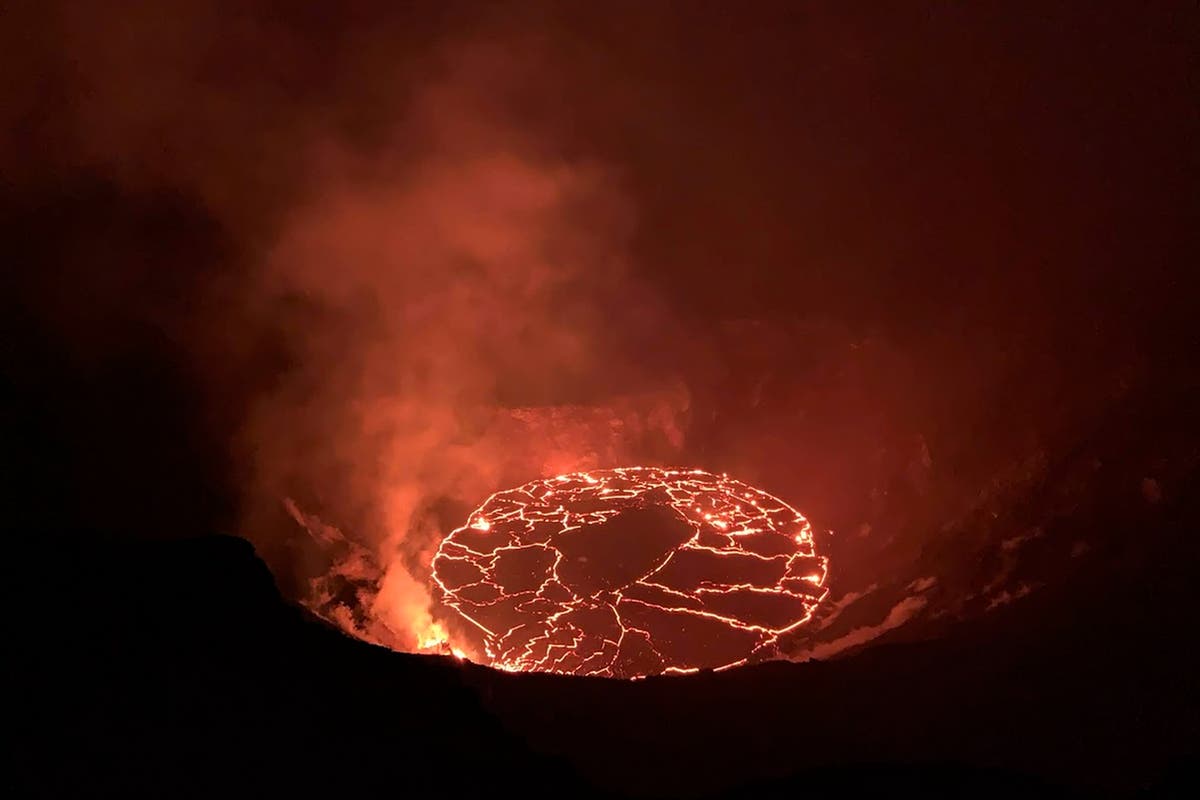 Lava spatters, flows inside crater of Hawaii volcano