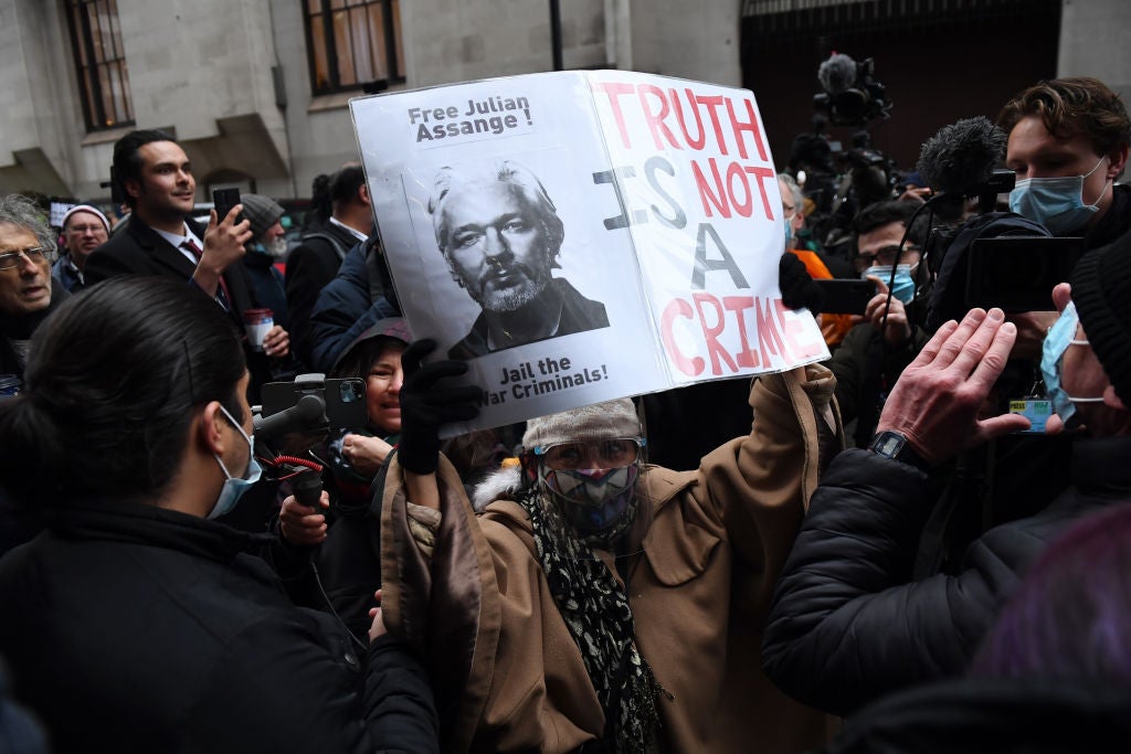 <p>Supporters of Julian Assange celebrate after the verdict outside the Old Bailey</p>