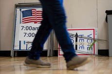 The Latest: Polls open for key Senate runoffs in Georgia