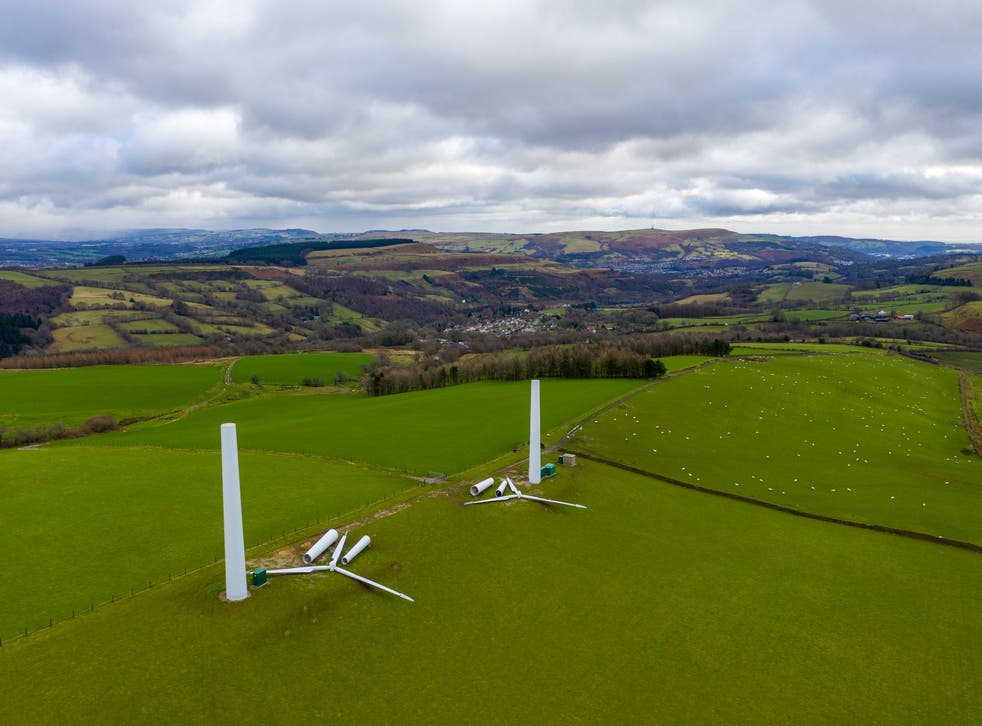 <p>Aerial view of a wind turbine being constructed from pieces in Rhondda, Wales</p>