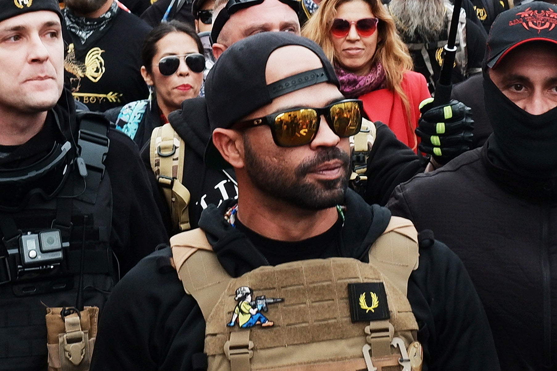 Proud Boys leader Enrique Tarrio, pictured on 12 December, was arrested in Washington DC on 4 January on destruction of property charges. He also was in possession of two high-capacity firearm magazines, unloaded.