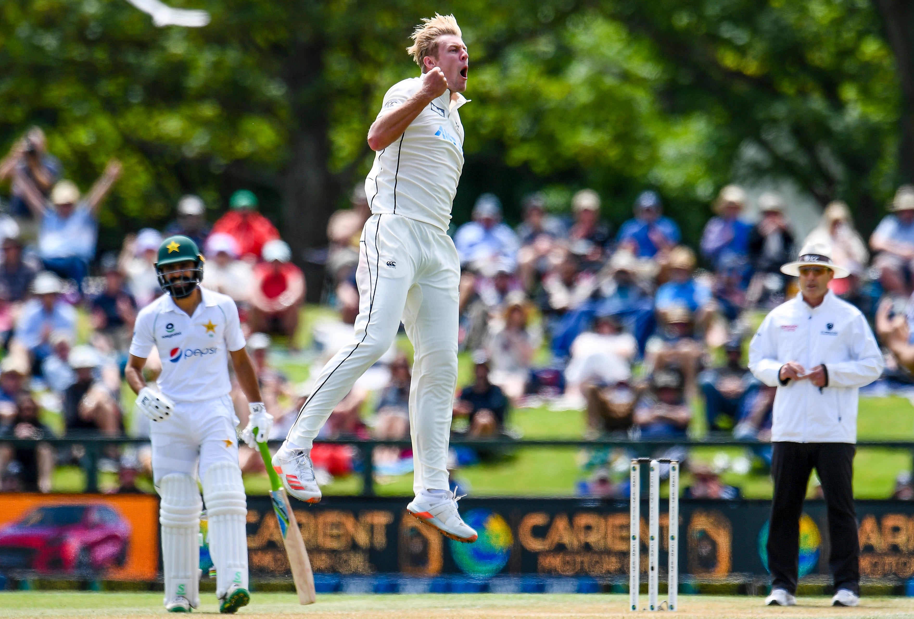 New Zealand bowler Kyle Jamieson celebrates after taking the wicket of Pakistan's Mohammad Rizwan