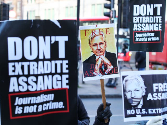 <p>Supporters of Assange outside Westminster Magistrates’ Court, London, on 6 January</p>