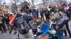 Trump supporters smash AP cameras during US Capitol riots