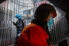 Asia Today: Virus restrictions heightened in China province