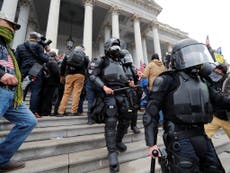 Trump supporters clash with police on Capitol steps