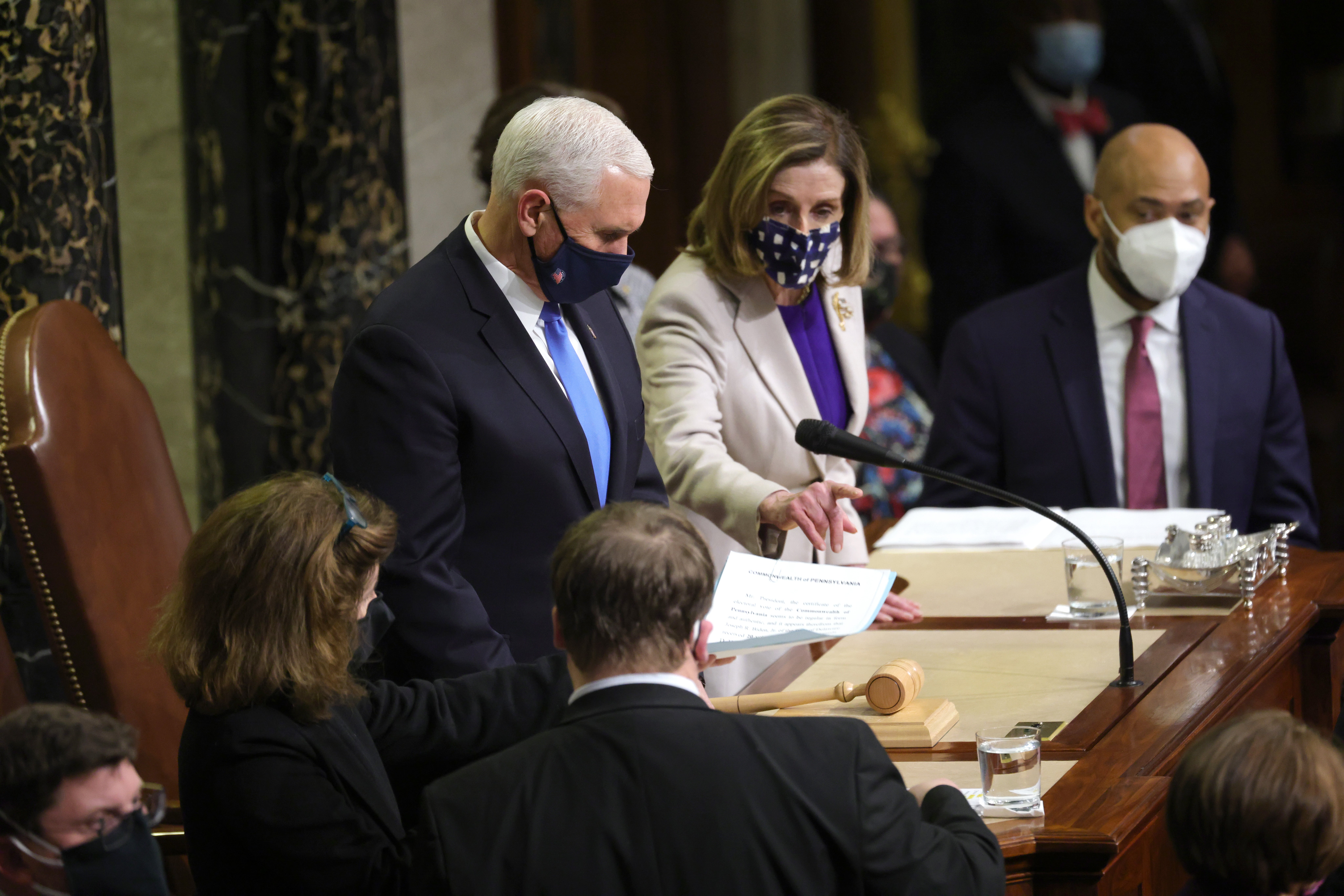 Vice President Pence and Speaker of the House Nancy Pelosi preside at the reconvened session to ratify Joe Biden’s election win