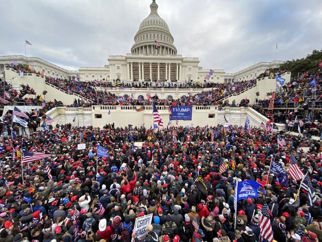 Donald Trump supporters pictured outside the Capitol building in Washington DC on 6 January, 2021.