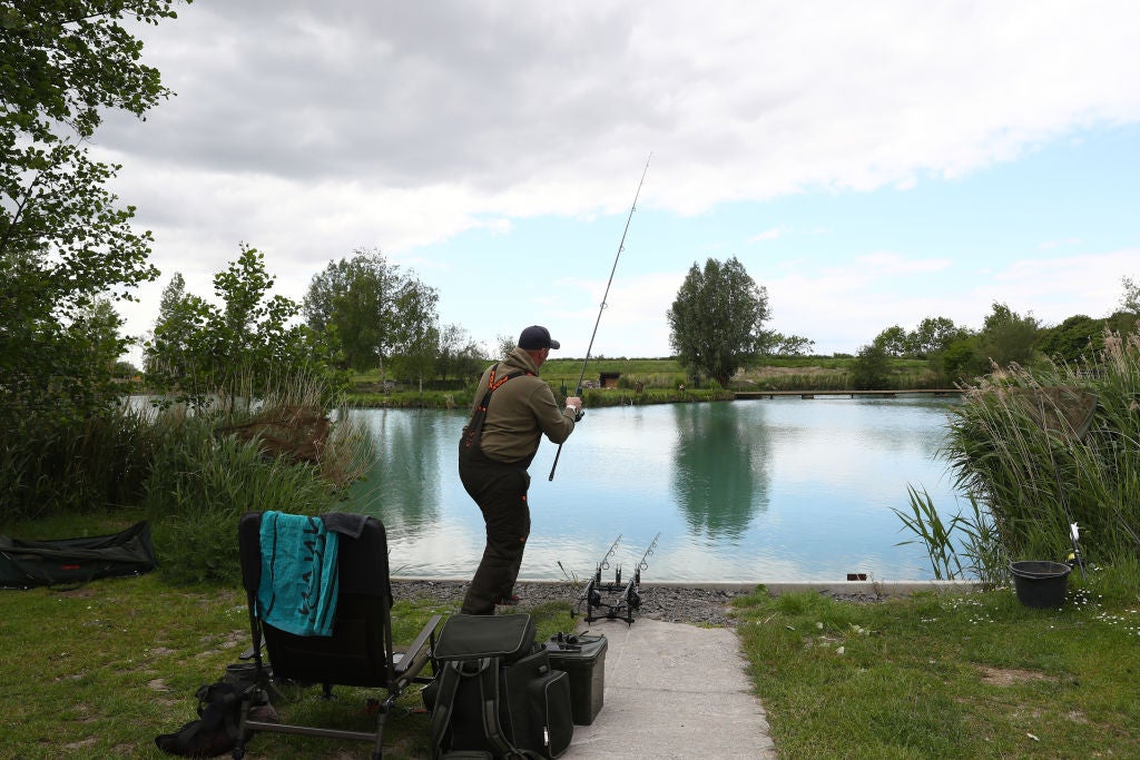 An angler casts off at Acorn Fisheries in Kingston Seymour, Somerset