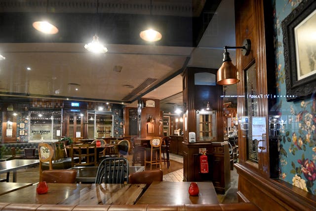<p>An empty pub after the announcement of more restrictions</p>
