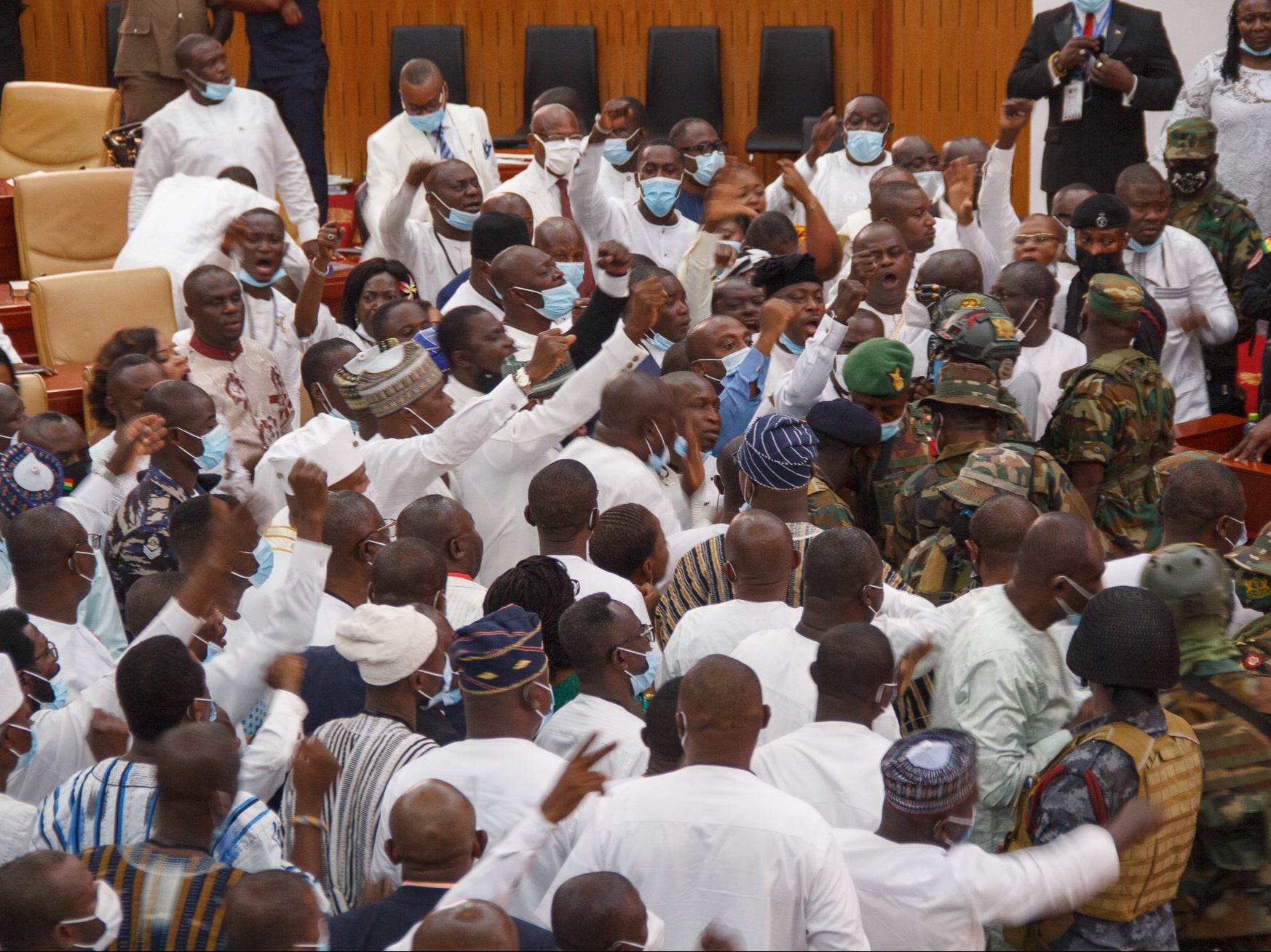 Ghanaian soldiers are seen at the parliament of Ghana during a scuffle between MPs in Accra, Ghana