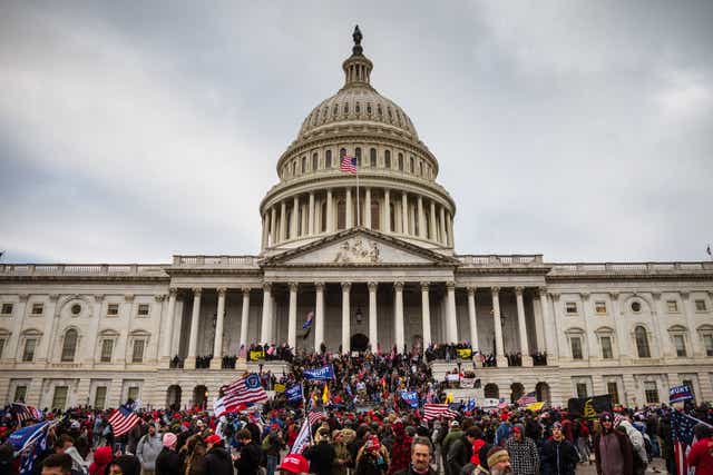 <p>A mob of Trump supporters invades the Capitol Building on 6 January</p>