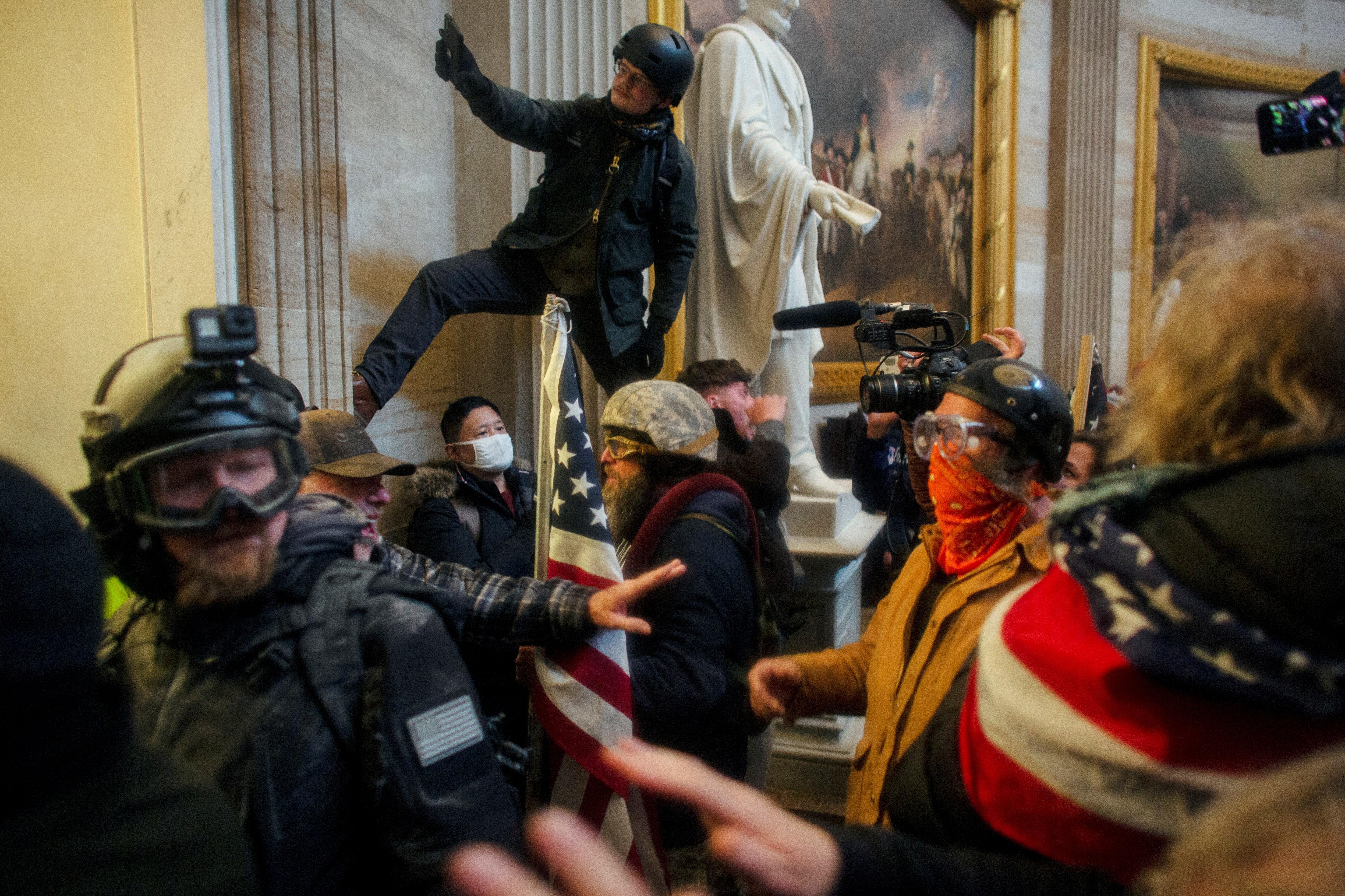 <p>Protesters storm the US Capitol on Wednesday</p>