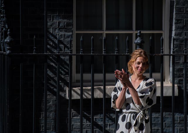 Annemarie Plas claps outside 10 Downing Street to mark the 72nd anniversary of the NHS on 5 July 2020