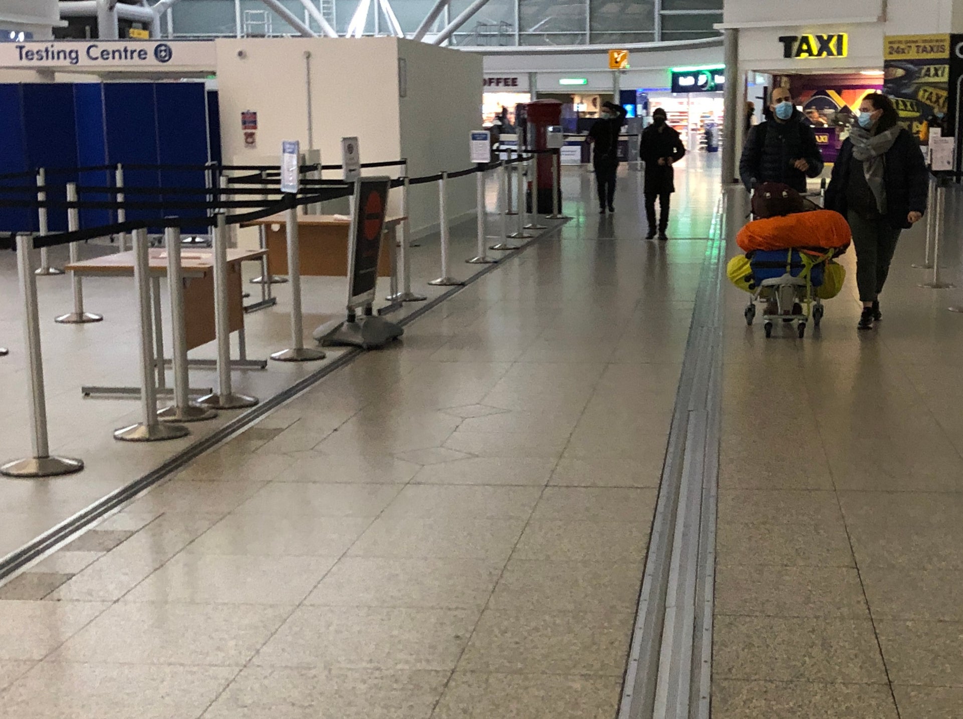 Testing times: passengers at Stansted airport