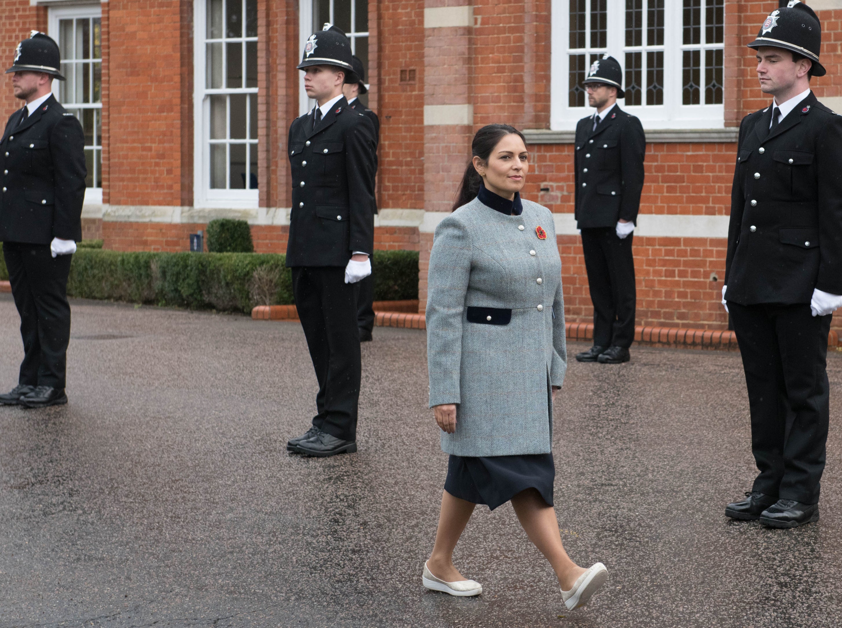 Home Secretary Priti Patel inspecting new police recruits at a passing out parade at Essex Police Headquarters in Chelmsford.