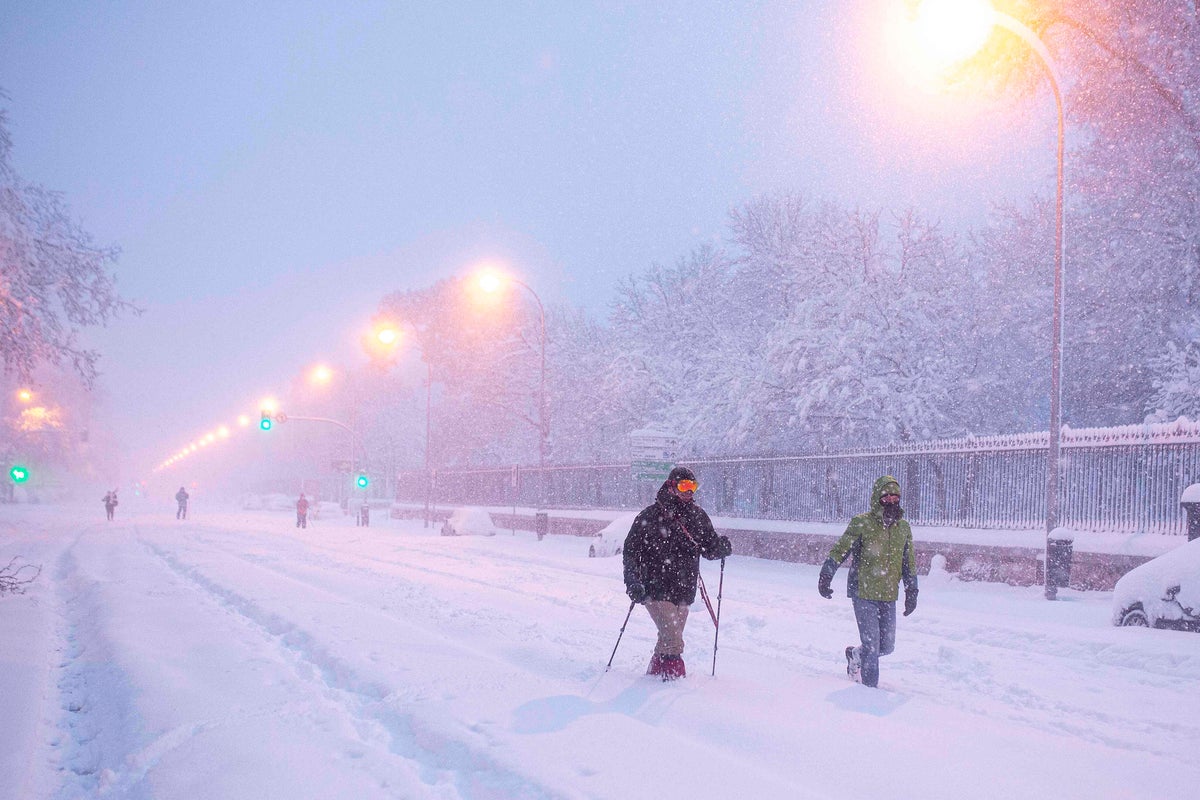 Hospital staff trek 20km to work through heavy snow in Spain as ...
